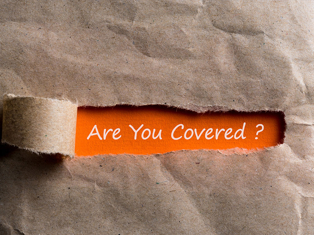 Are you covered - question written on orange paper in brown envelope